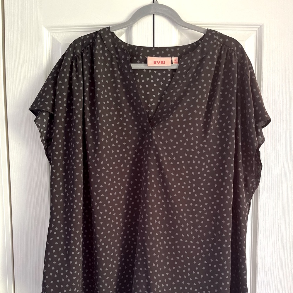 Short sleeved Blouse with hearts.